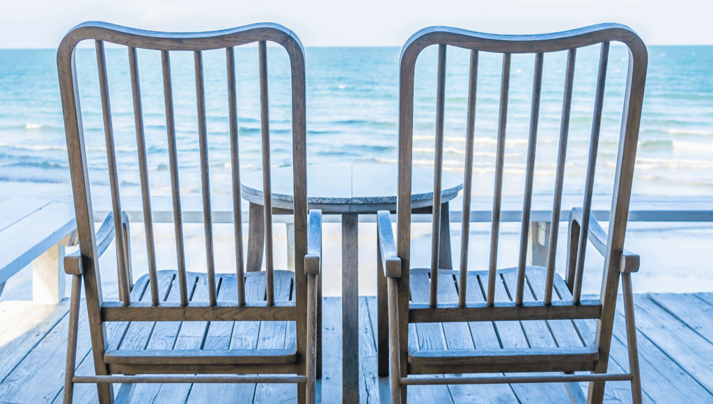 empty-wood-chair-table-outdoor-patio-with-beautiful-tropical-beach-sea-fotor-20251030214629